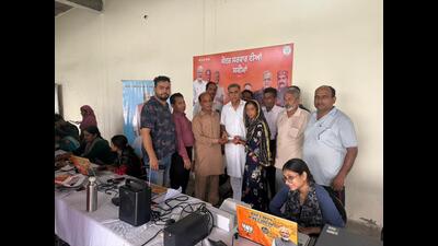 According to information, the BJP had hired a few professionals, who the BJP claims were party workers with laptops and KYC to enrol state residents into various central schemes. According to information, the BJP had hired a few professionals, who the BJP claims were party workers with laptops and KYC to enrol state residents into various central schemes.
