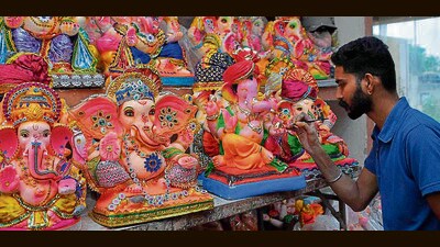 An artist giving final touches to Ganesha idols in Ludhiana on Wednesday. (Manish/HT) An artist giving final touches to Ganesha idols in Ludhiana on Wednesday. (Manish/HT)
