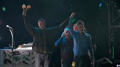 Liam Gallagher (L), lead singer and Noel Gallagher (R), singer and guitarist of British rock band Oasis take to the stage at the Principality Stadium in Cardiff on July 4, 2025, (AFP) Liam Gallagher (L), lead singer and Noel Gallagher (R), singer and guitarist of British rock band Oasis take to the stage at the Principality Stadium in Cardiff on July 4, 2025, (AFP)