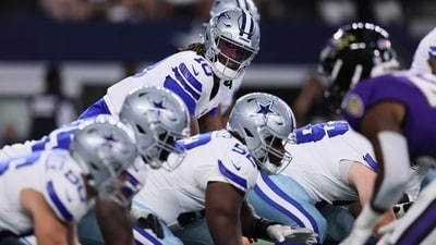 Joe Milton III #10 of the Dallas Cowboys looks over the line of scrimmage during the first half vs Baltimore Ravens (Getty Images via AFP) Joe Milton III #10 of the Dallas Cowboys looks over the line of scrimmage during the first half vs Baltimore Ravens (Getty Images via AFP)