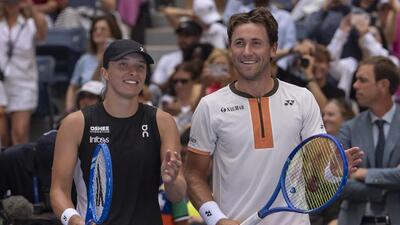 Iga Swiatek and Casper Ruud at mixed doubles match at the U.S. Open in New York. (AP) Iga Swiatek and Casper Ruud at mixed doubles match at the U.S. Open in New York. (AP)