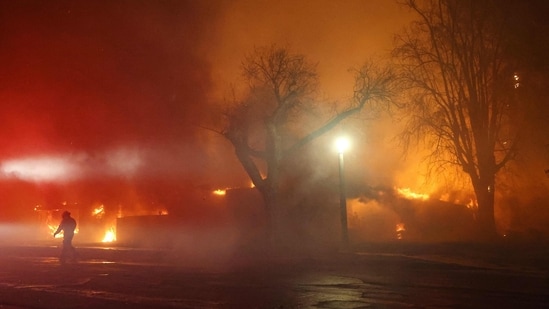 The Palisades fire caused massive damage and loss of life. Federal investigators are probing the cause, delaying the city’s report. (Getty Images via AFP)