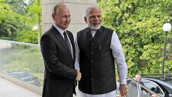 File photo: Russian President Vladimir Putin and Prime Minister Narendra Modi pose for a photo during their meeting in Russia. (AP)