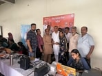 According to information, the BJP had hired a few professionals, who the BJP claims were party workers with laptops and KYC to enrol state residents into various central schemes.