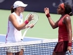 Iga Swiatek of Poland congratulates Coco Gauff after their match during the semifinals of the Western & Southern Open at Lindner Family Tennis Center on August 19