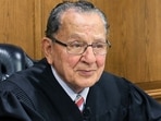 Providence municipal court judge Frank Caprio sits on a bench on August 10, 2017. 