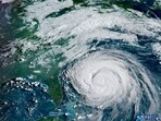 Hurricane Erin, classified as a Category 2 storm with 110 mph winds, is impacting the East Coast. (Photo by Handout / NOAA / AFP) 