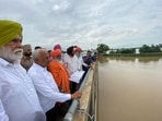 With the weather department predicting continued rainfall in Himachal Pradesh and Punjab, no immediate respite is in sight for residents living along the swollen Beas and Sutlej rivers. (HT Photo)