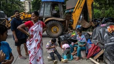 Mumbai, India - August 21, 2025: After the demolition of the Jai Bhim Nagar slum in Powai, residents who had built temporary homes on the footpaths were evicted today, as the BMC demolished their huts following the Supreme Court’s order in Mumbai, India, on Tuesday, August 21, 2025. (Photo by Satish Bate/ Hindustan Times) (Hindustan Times) Mumbai, India - August 21, 2025: After the demolition of the Jai Bhim Nagar slum in Powai, residents who had built temporary homes on the footpaths were evicted today, as the BMC demolished their huts following the Supreme Court’s order in Mumbai, India, on Tuesday, August 21, 2025. (Photo by Satish Bate/ Hindustan Times) (Hindustan Times)