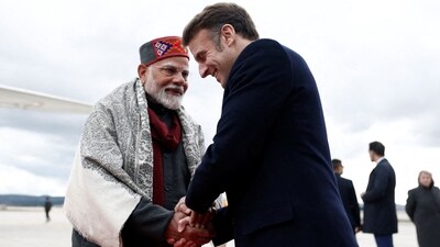 French President Emmanuel Macron shakes hands with Prime Minister Narendra Modi (File Photo/AFP) French President Emmanuel Macron shakes hands with Prime Minister Narendra Modi (File Photo/AFP)