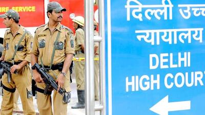 Police commandos stand guard in front of Delhi high court in New Delhi. Police commandos stand guard in front of Delhi high court in New Delhi.