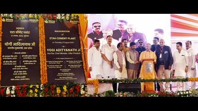 Uttar Pradesh chief minister Yogi Adityanath inaugurates the Shri Cement Plant in Eta under the new industrial policy. in Eta on Thursday. (ANI)