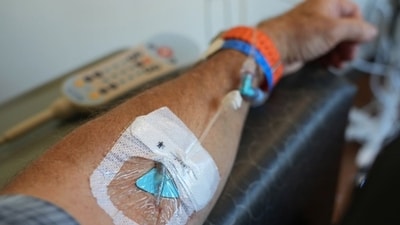 A caner patient receives immunotherapy medication. A caner patient receives immunotherapy medication.
