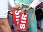 Leader of Opposition in Lok Sabha and Congress MP Rahul Gandhi and other INDIA bloc MPs symbolically tear the SIR and throw it in a dustbin during their protest against Special Intensive Revision (SIR) of electoral rolls in Bihar. Leader of Opposition in Lok Sabha and Congress MP Rahul Gandhi and other INDIA bloc MPs symbolically tear the SIR and throw it in a dustbin during their protest against Special Intensive Revision (SIR) of electoral rolls in Bihar.