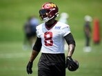 Washington Commanders running back Brian Robinson Jr. (8) works out during practice at NFL football minicamp Washington Commanders running back Brian Robinson Jr. (8) works out during practice at NFL football minicamp