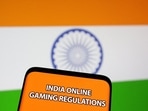 The words "India online gaming regulations" are displayed in front of an Indian flag in this Illustration taken September 14, 2022.