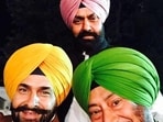Punjabi actor Jaswinder Bhalla with his friends Gurbhajan Singh Gill (in yellow turban) and Punjab Agricultural University (PAU) professor Mann Singh Toor (standing behind) in Ludhiana. (File photo)