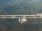 TOPSHOT - An ariel view of a migrant detention center, dubbed "Alligator Alcatraz," is seen located at the site of the Dade-Collier Training and Transition Airport in Ochopee, Florida on July 7, 2025.