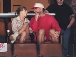 Singer Taylor Swift, left, and Kansas City Chiefs football player Travis Kelce, front right, at an NHL game Singer Taylor Swift, left, and Kansas City Chiefs football player Travis Kelce, front right, at an NHL game