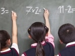 Three school children doing math equations on the blackboard (Getty Images/iStockphoto) Three school children doing math equations on the blackboard (Getty Images/iStockphoto)