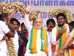 Union Home Minister Amit Shah being garlanded by BJP leaders during the 'Booth Karyakarta Sammelan', in Tirunelveli on Friday. (@AmitShahX) Union Home Minister Amit Shah being garlanded by BJP leaders during the 'Booth Karyakarta Sammelan', in Tirunelveli on Friday. (@AmitShahX)