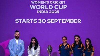 Indian team players Jemimah Rodrigues (R), Smriti Mandhana (2R) and Harmanpreet Kaur (C) pose with the trophy alongside former player Yuvraj Singh (L) (AFP) Indian team players Jemimah Rodrigues (R), Smriti Mandhana (2R) and Harmanpreet Kaur (C) pose with the trophy alongside former player Yuvraj Singh (L) (AFP)