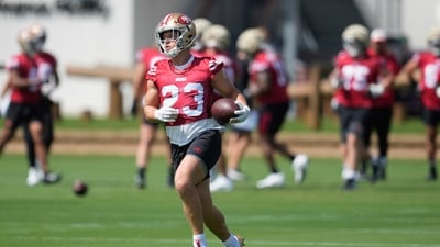 San Francisco 49ers running back Christian McCaffrey (23) runs during practice at the team's football training camp (AP) San Francisco 49ers running back Christian McCaffrey (23) runs during practice at the team's football training camp (AP)