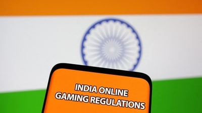 The words "India online gaming regulations" are displayed in front of an Indian flag in this Illustration taken September 14, 2022. (Reuters)