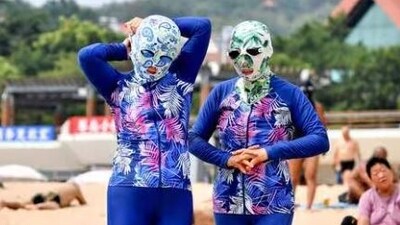 Facekinis form part of a thriving industry in China offering accessories to protect against ultraviolet (UV) rays. (AFP FILE PHOTO)