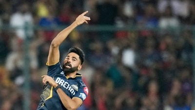Mohammed Siraj played for Gujarat Titans after being released by RCB (AP) Mohammed Siraj played for Gujarat Titans after being released by RCB (AP)