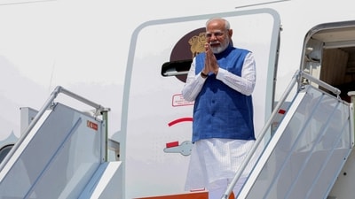 Prime Minister Narendra Modi gestures as he steps off the plane in Zagreb, Croatia, on June 18, 2025. (AFP) Prime Minister Narendra Modi gestures as he steps off the plane in Zagreb, Croatia, on June 18, 2025. (AFP)