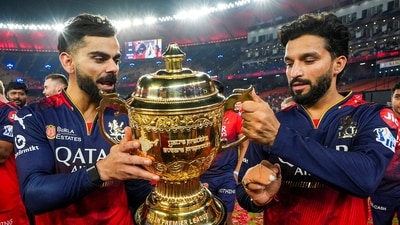 Virat Kohli and Rajat Patidar celebrate lifting the IPL 2025 trophy together. (PTI) Virat Kohli and Rajat Patidar celebrate lifting the IPL 2025 trophy together. (PTI)