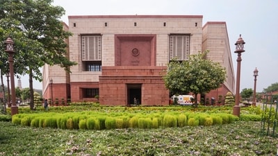 In a security breach, a man scaled a wall of Parliament on Friday morning but was caught by security personnel and handed over to police. (PTI) In a security breach, a man scaled a wall of Parliament on Friday morning but was caught by security personnel and handed over to police. (PTI)