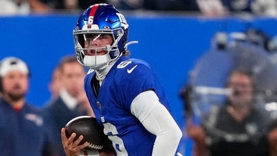 New York Giants quarterback Jaxson Dart (6) carries the all against the New England Patriots (AP) New York Giants quarterback Jaxson Dart (6) carries the all against the New England Patriots (AP)