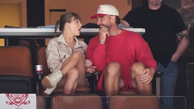 Singer Taylor Swift, left, and Kansas City Chiefs football player Travis Kelce, front right, at an NHL game (AP) Singer Taylor Swift, left, and Kansas City Chiefs football player Travis Kelce, front right, at an NHL game (AP)