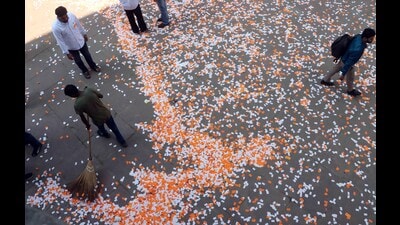 The stickers, strewn by SOI members after the announcement of their panel, being swept at the Student Centre in Panjab University on Friday. (KESHAV SINGH/HT) The stickers, strewn by SOI members after the announcement of their panel, being swept at the Student Centre in Panjab University on Friday. (KESHAV SINGH/HT)