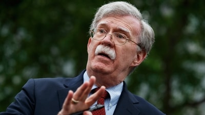 FILE - National security adviser John Bolton talks to reporters about Venezuela, outside the White House, May 1, 2019, in Washington. (AP Photo/Evan Vucci File) (AP) FILE - National security adviser John Bolton talks to reporters about Venezuela, outside the White House, May 1, 2019, in Washington. (AP Photo/Evan Vucci File) (AP)