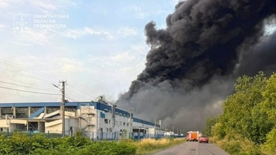 Smoke rises over the Flextronics factory hit by a Russian missile strike, amid Russia's attack on Ukraine, in Mukachevo, Zakarpattia region, Ukraine August 21, 2025. Zakarpattia Regional Prosecutor's Office/Handout via REUTERS (via REUTERS)