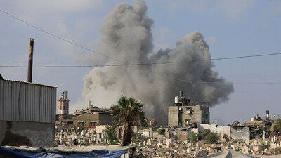 Smoke rises following an Israeli strike, in Gaza City, August 22 (REUTERS)