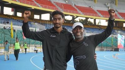 relays coach Jason Dawson (R) with Vishal TK. (Special Arrangement) relays coach Jason Dawson (R) with Vishal TK. (Special Arrangement)