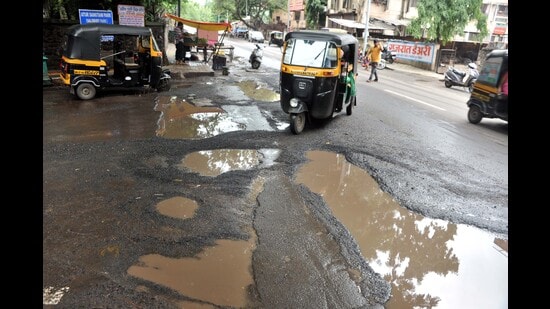 Continuous heavy rainfall has laid bare even repaired potholes, leaving roads scarred by craters and loose gravel and inconveniencing motorists and pedestrians no end. (REPRESENTATIVE PHOTO)