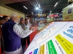 Prime Minister Narendra Modi inspects an exhibition during the flagging off ceremony of metro trains, in Kolkata Prime Minister Narendra Modi inspects an exhibition during the flagging off ceremony of metro trains, in Kolkata
