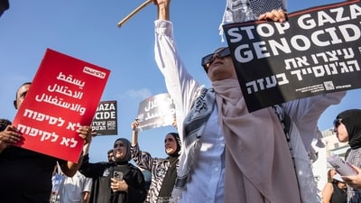 Israeli and Palestinian activists take part in a protest calling for the end of the war and an end to starvation in the Gaza Strip, as they gather in Tel Aviv, Israel, Aug. 23, 2025 (AP) Israeli and Palestinian activists take part in a protest calling for the end of the war and an end to starvation in the Gaza Strip, as they gather in Tel Aviv, Israel, Aug. 23, 2025 (AP)
