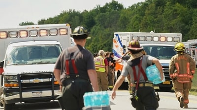 Rescue personnel work the scene of a tour bus that crashed and rolled over on the New York State Thruway near Pembroke, New York. (AP) Rescue personnel work the scene of a tour bus that crashed and rolled over on the New York State Thruway near Pembroke, New York. (AP)