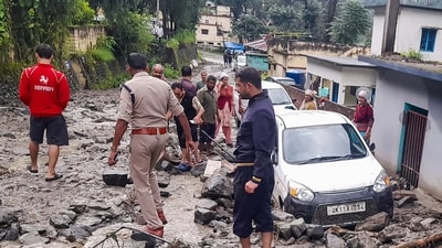 A police official and others during a search and rescue operation at an affected area after heavy rainfall in Chamoli district, Uttarakhand. (@uttarakhandcops/X) A police official and others during a search and rescue operation at an affected area after heavy rainfall in Chamoli district, Uttarakhand. (@uttarakhandcops/X)
