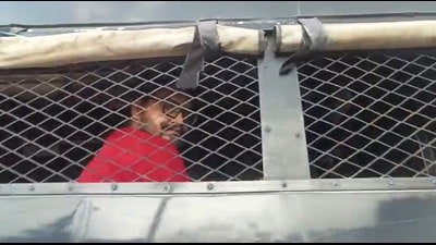 Umar Ansari being brought in a police van to Kasganj District Jail on Saturday. (HT Photo)