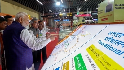 Prime Minister Narendra Modi inspects an exhibition during the flagging off ceremony of metro trains, in Kolkata (@narendramodi X) Prime Minister Narendra Modi inspects an exhibition during the flagging off ceremony of metro trains, in Kolkata (@narendramodi X)
