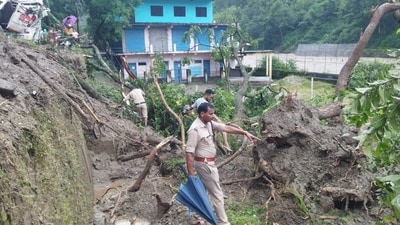 Morning visuals from Saturday revealed damaged houses and roads, uprooted trees, and vehicles buried under mud and rubble. State Disaster Management Secretary Vinod Kumar Suman said a woman remained trapped under debris while another man had gone missing since the rains began. (HT Photo) Morning visuals from Saturday revealed damaged houses and roads, uprooted trees, and vehicles buried under mud and rubble. State Disaster Management Secretary Vinod Kumar Suman said a woman remained trapped under debris while another man had gone missing since the rains began. (HT Photo)
