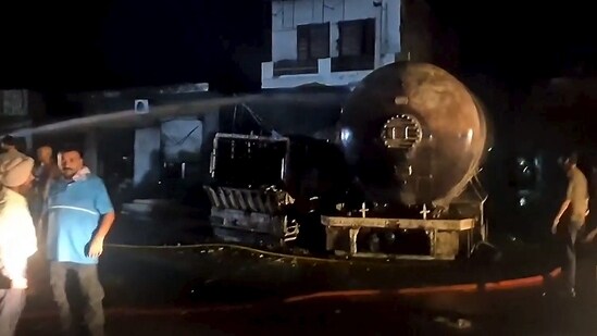 Fire personnel doused a fire in an LPG tanker late Friday on the Hoshiarpur-Jalandhar road in Hoshiarpur, Punjab. (PTI)