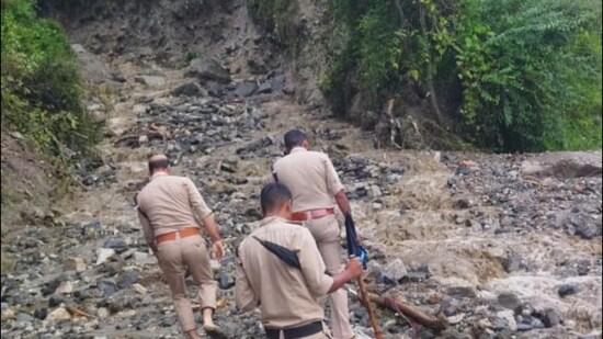 Roads leading to Tharali, the area hit by the cloudburst, were blocked at several points due to landslides, hindering movement. Although restoration efforts are underway in Chamoli, the District Magistrate was unable to reach the affected areas because of road closures, the Disaster Management Secretary confirmed.(HT Photo)